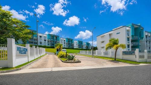 CARACOLES BUILDING COND HILLSIDE VILLAGE
